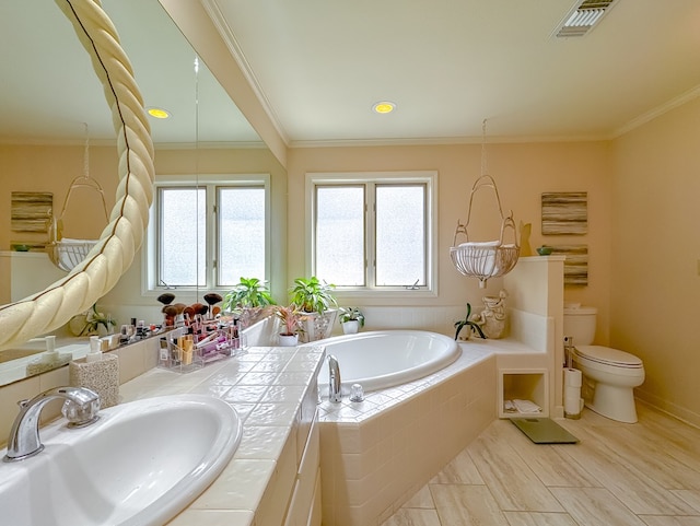 full bath featuring crown molding, visible vents, toilet, vanity, and a bath