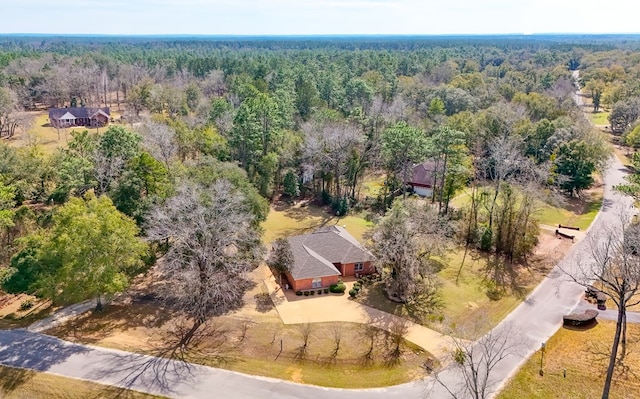 aerial view with a wooded view