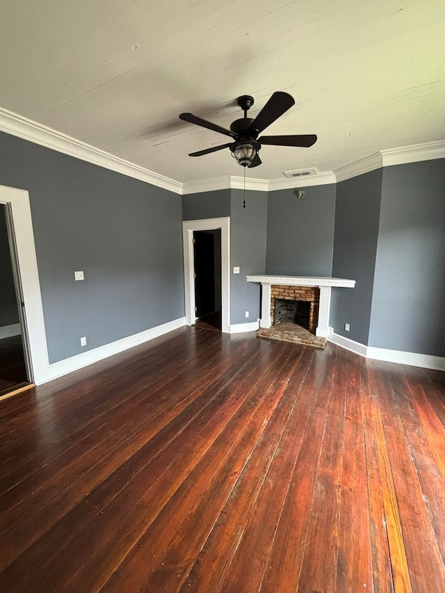 unfurnished living room featuring ceiling fan, dark hardwood / wood-style floors, ornamental molding, and a brick fireplace