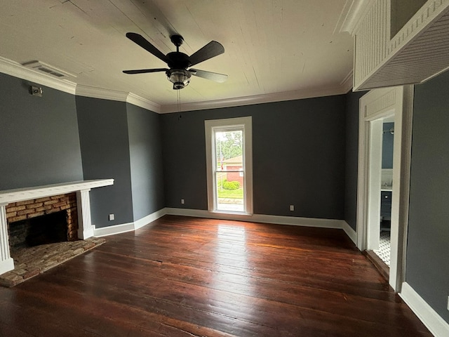 unfurnished living room with a fireplace, crown molding, ceiling fan, and dark wood-type flooring