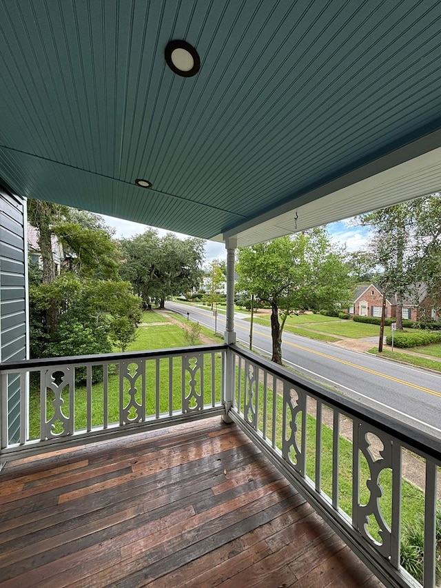 wooden terrace featuring a porch