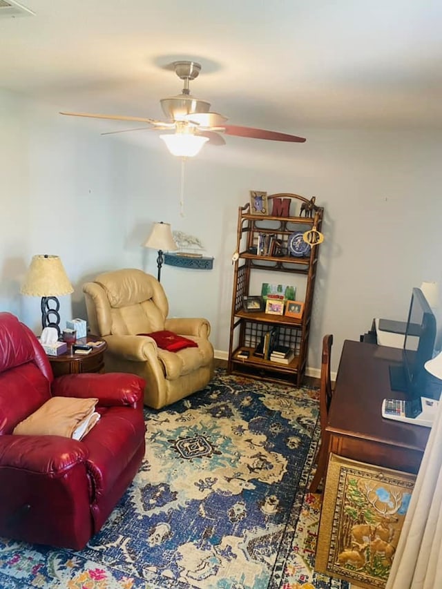 living room with ceiling fan