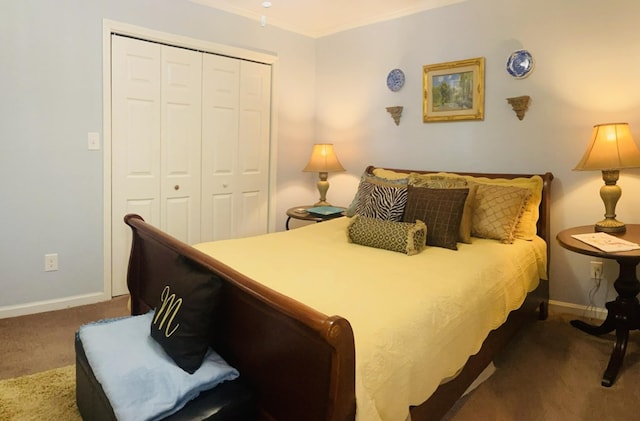 carpeted bedroom with a closet and ornamental molding