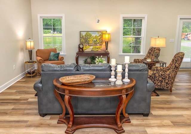 sitting room with light hardwood / wood-style flooring