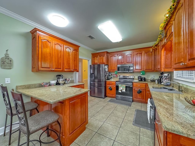 kitchen with stainless steel appliances, crown molding, light stone countertops, and sink