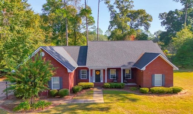 view of front facade with a porch and a front yard