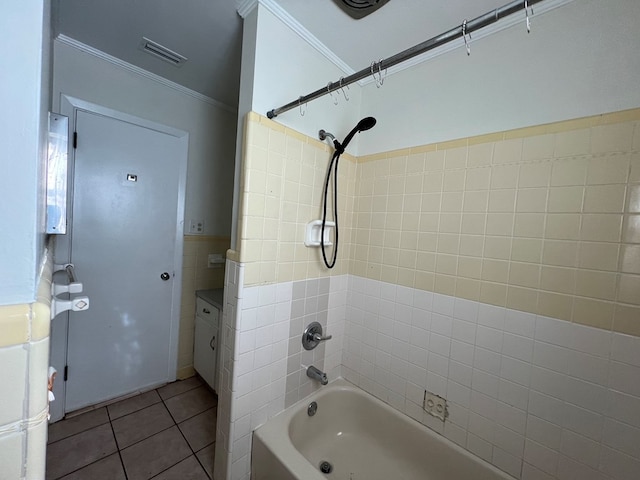 bathroom featuring crown molding, tile patterned floors, bathing tub / shower combination, and vanity