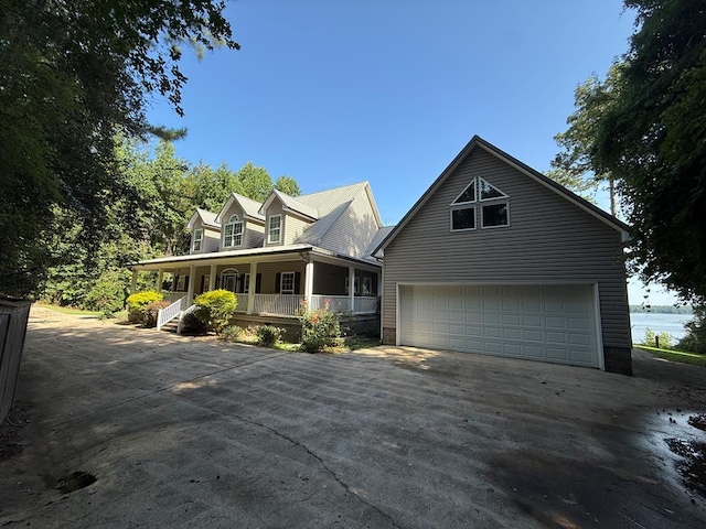 742 Booster Club Rd, Bainbridge, GA 39819 - view of front facade featuring covered porch, driveway, and an attached garage