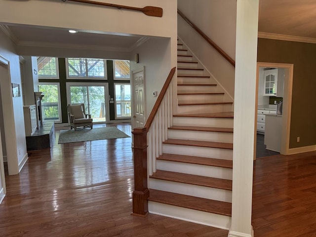 742 Booster Club Rd, Bainbridge, GA 39819 - stairway featuring crown molding and wood finished floors