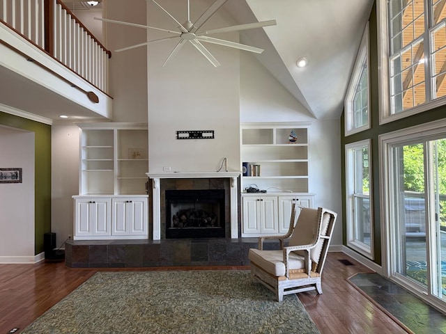 742 Booster Club Rd, Bainbridge, GA 39819 - living area with high vaulted ceiling, wood finished floors, built in features, a fireplace, and recessed lighting