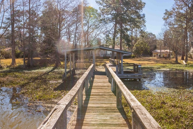 dock area featuring a water view