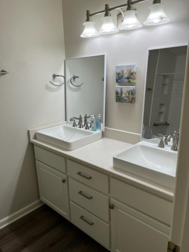 1355 SE Brookwood Dr, Cairo, GA 39828 - empty room with a textured ceiling, ceiling fan, light carpet, and baseboards
