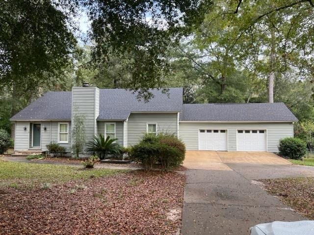 ranch-style home with a garage