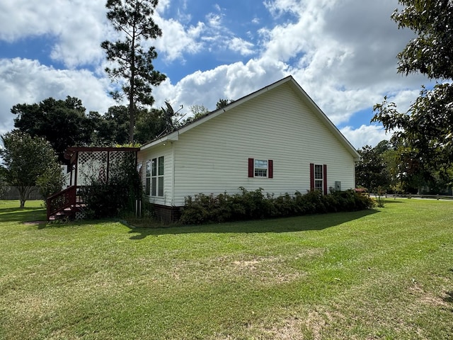 view of property exterior featuring a yard