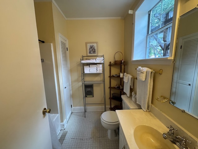 1001 Hall St, Bainbridge, GA 39819 - bathroom featuring a closet, ornamental molding, vanity, and tile patterned flooring