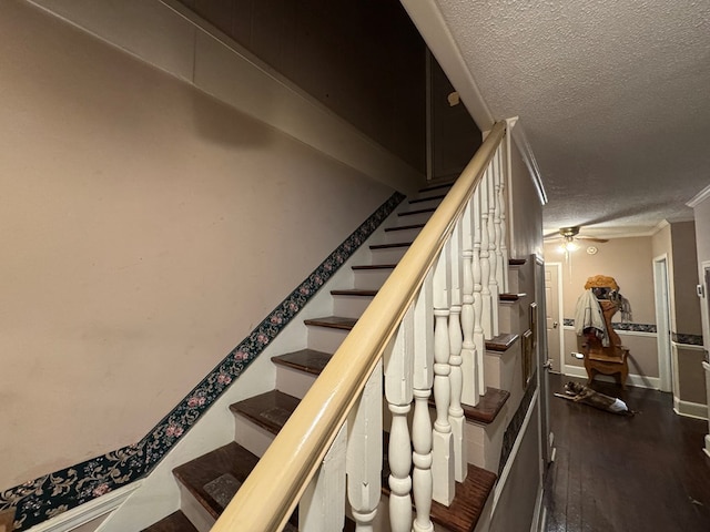1001 Hall St, Bainbridge, GA 39819 - stairs featuring a textured ceiling, crown molding, and wood finished floors