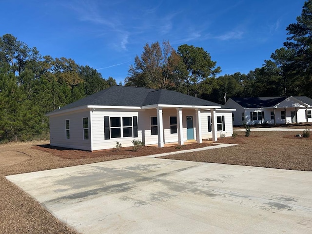 ranch-style home with covered porch