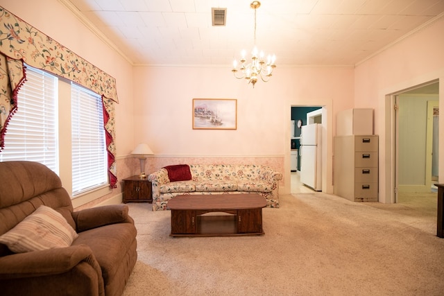 carpeted living area with visible vents, ornamental molding, and a chandelier
