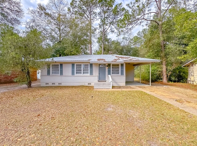 single story home featuring a carport