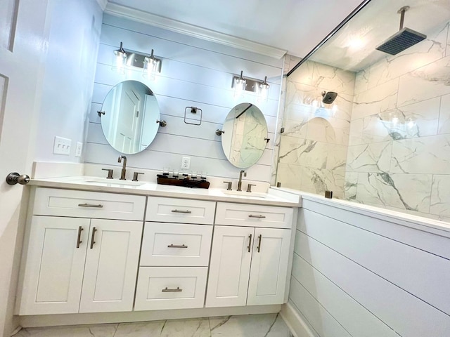 bathroom featuring tiled shower and vanity