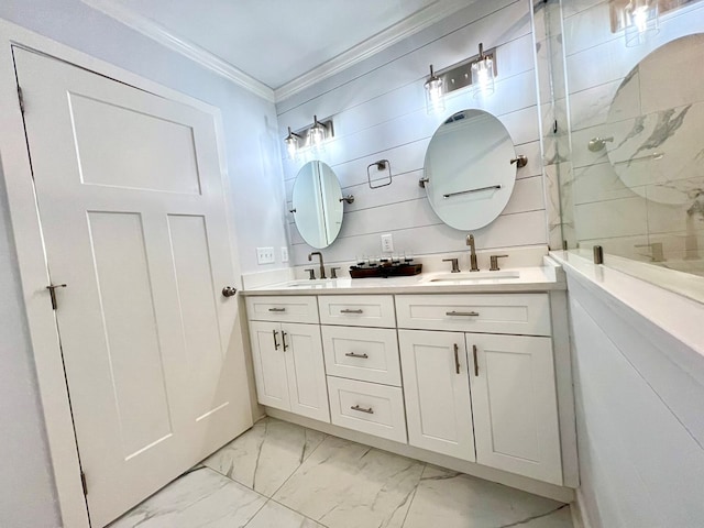 bathroom with ornamental molding and vanity