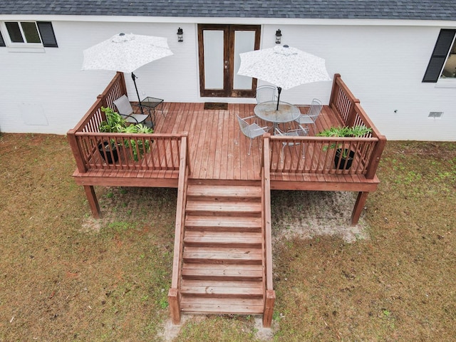 deck featuring a yard