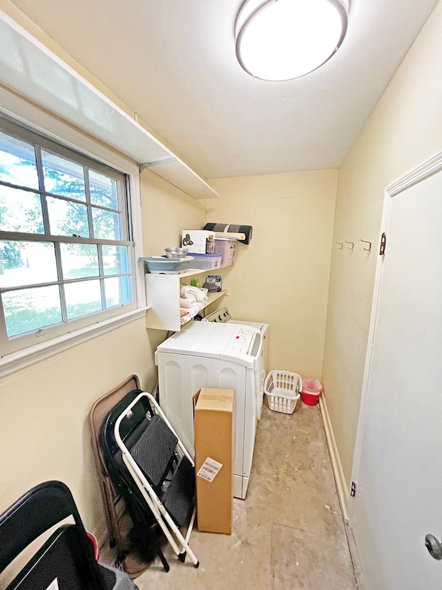 washroom featuring washer and dryer