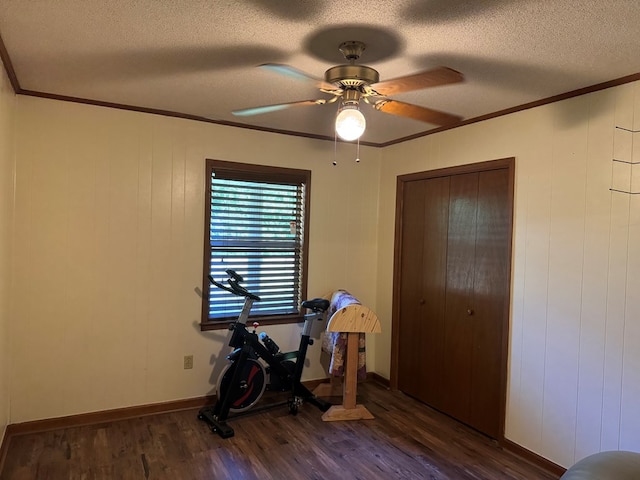 145 Robin Ln, Bainbridge, GA 39819 - workout area with wood finished floors, ornamental molding, a textured ceiling, and ceiling fan