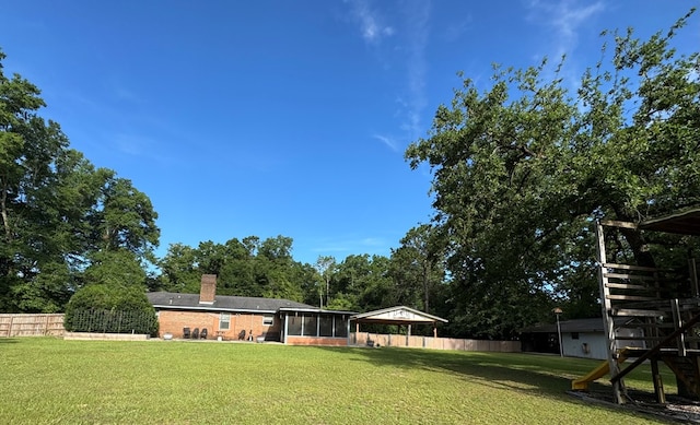 145 Robin Ln, Bainbridge, GA 39819 - view of yard with a sunroom