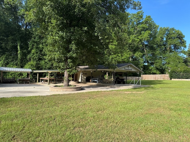 145 Robin Ln, Bainbridge, GA 39819 - view of yard with concrete driveway and an attached carport
