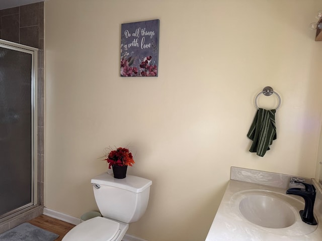 145 Robin Ln, Bainbridge, GA 39819 - bathroom featuring a shower stall, vanity, and wood finished floors