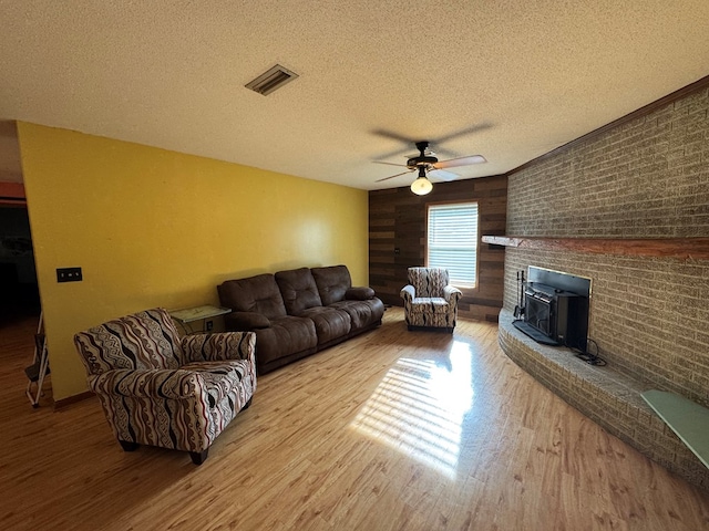 145 Robin Ln, Bainbridge, GA 39819 - living area with wood finished floors, a ceiling fan, and a textured ceiling