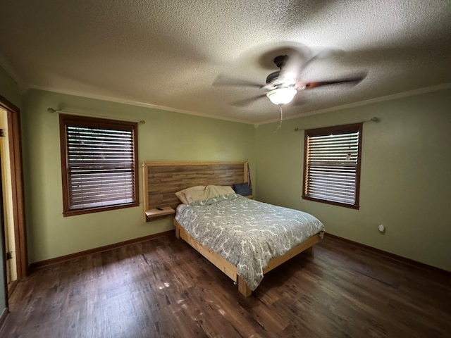 145 Robin Ln, Bainbridge, GA 39819 - bedroom featuring a textured ceiling, wood finished floors, ornamental molding, and a ceiling fan