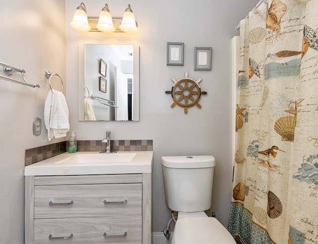 1107 Douglas Dr, Bainbridge, GA 39819 - bathroom with vanity, toilet, and a shower with curtain