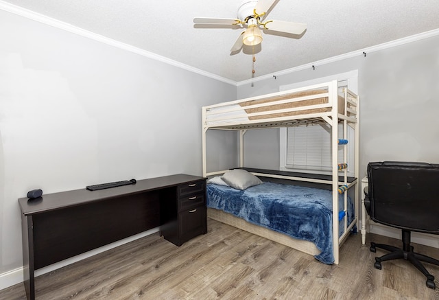 1107 Douglas Dr, Bainbridge, GA 39819 - bedroom featuring ornamental molding, wood finished floors, and ceiling fan