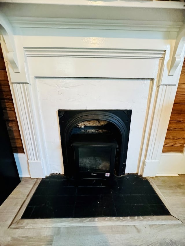 interior details featuring a wood stove