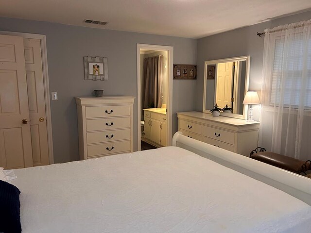 851 Colquitt Hwy, Bainbridge, GA 39817 - bedroom featuring connected bathroom
