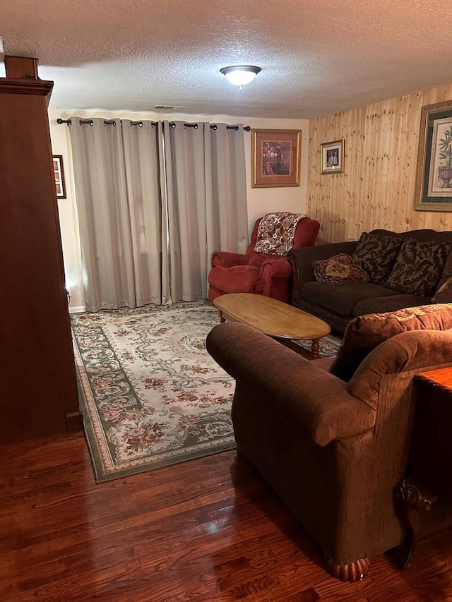 851 Colquitt Hwy, Bainbridge, GA 39817 - living room featuring a textured ceiling and wood finished floors
