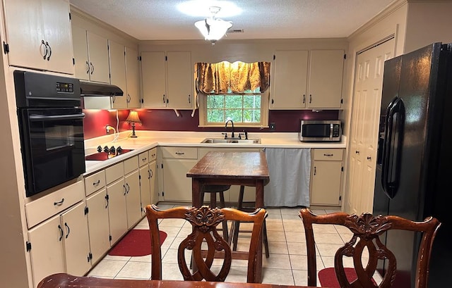 851 Colquitt Hwy, Bainbridge, GA 39817 - kitchen featuring black appliances, a sink, under cabinet range hood, light countertops, and ornamental molding