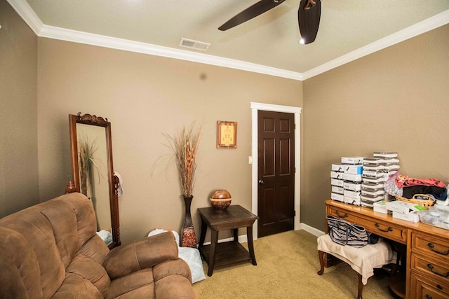 home office with light carpet, ceiling fan, and ornamental molding