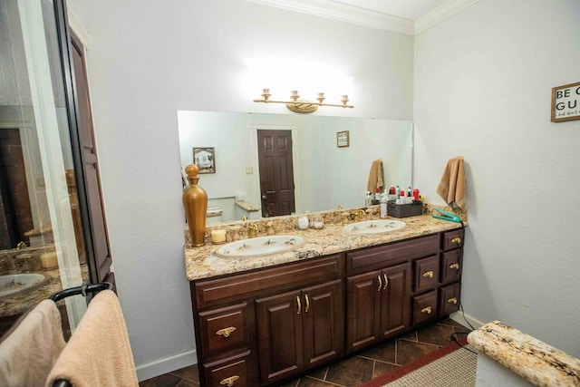 179 Azalea Cir, Bainbridge, GA 39819 - full bathroom featuring double vanity, ornamental molding, and baseboards