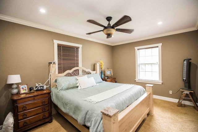 bedroom with ceiling fan, light colored carpet, and ornamental molding