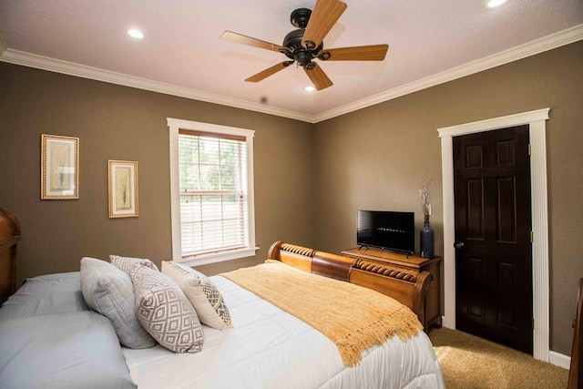 bedroom featuring carpet, ceiling fan, and ornamental molding