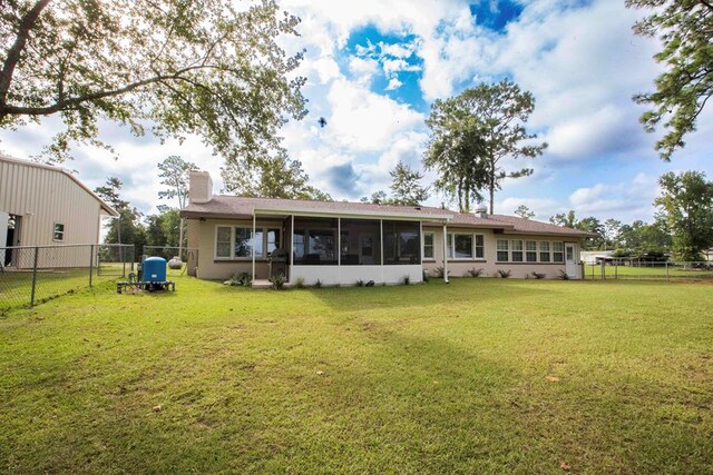 179 Azalea Cir, Bainbridge, GA 39819 - rear view of house featuring a sunroom and a chimney