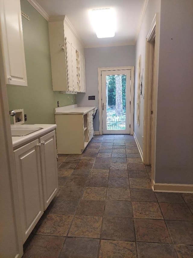 1490 Magnolia Dr, Cairo, GA 39828 - laundry area with cabinet space, crown molding, hookup for a washing machine, stone tile floors, and baseboards