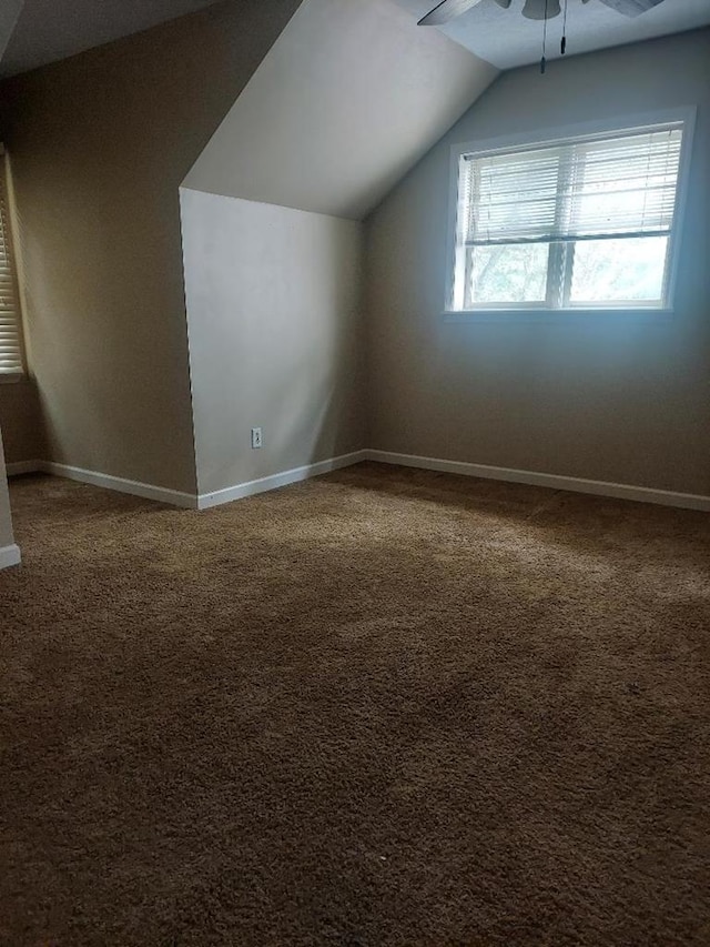 1490 Magnolia Dr, Cairo, GA 39828 - bonus room with baseboards, a ceiling fan, carpet floors, and vaulted ceiling