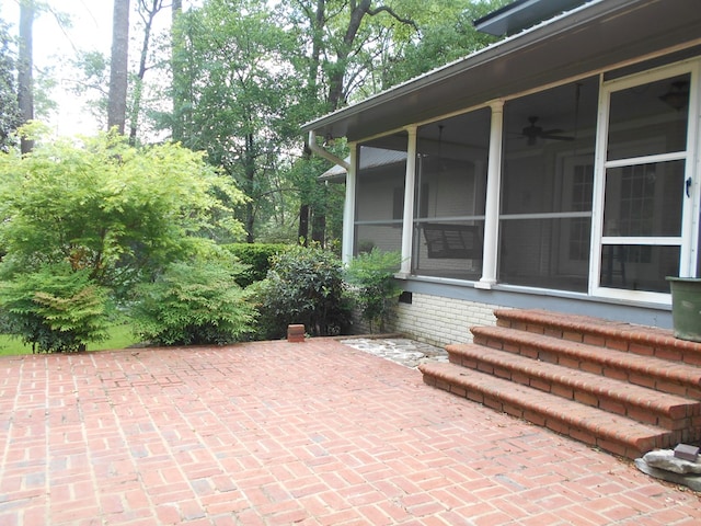 1490 Magnolia Dr, Cairo, GA 39828 - view of patio with a ceiling fan and a sunroom