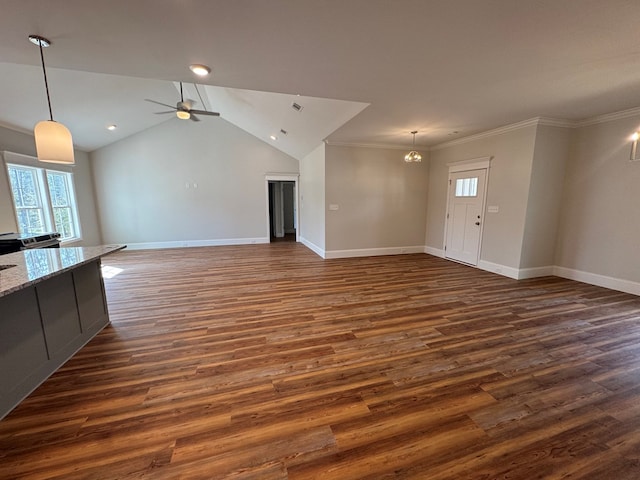 unfurnished living room featuring lofted ceiling, ceiling fan, dark wood-style flooring, and baseboards