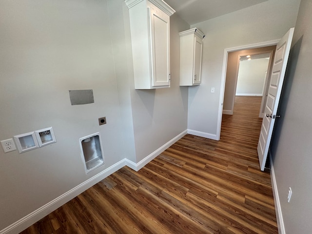 clothes washing area featuring dark wood-style floors, hookup for a washing machine, cabinet space, hookup for an electric dryer, and baseboards