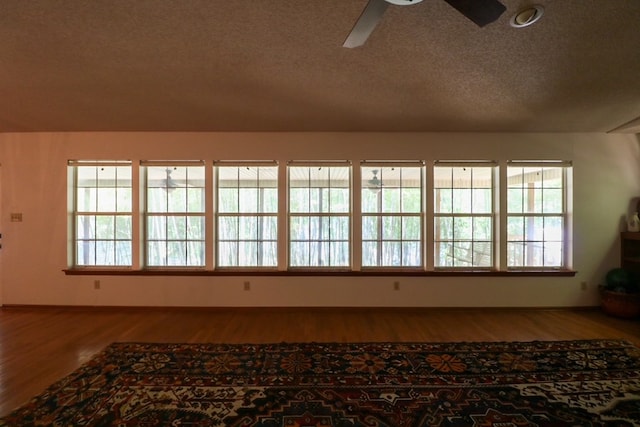 407 Lakeshore Dr, Bainbridge, GA 39819 - unfurnished room featuring a textured ceiling, a ceiling fan, and wood finished floors